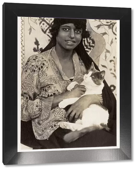 Egyptian woman with large cat