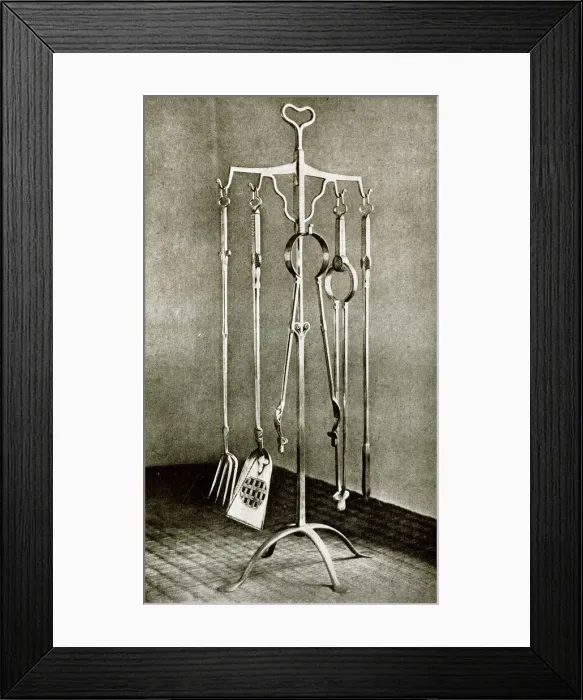 Framed Print : Stand of fire irons in polished wrought iron Framed Print : Stand of fire irons in polished wrought iron