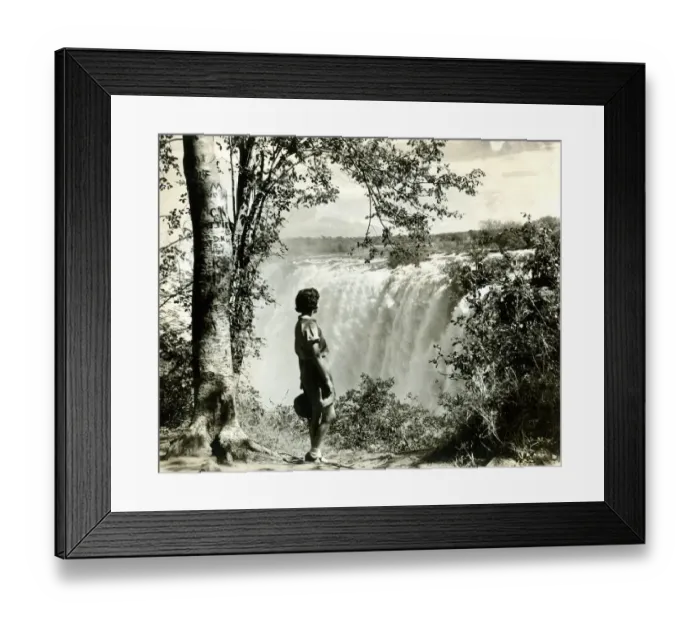 Framed Print : Girl standing by Victoria Falls, southern Africa Framed Print : Girl standing by Victoria Falls, southern Africa