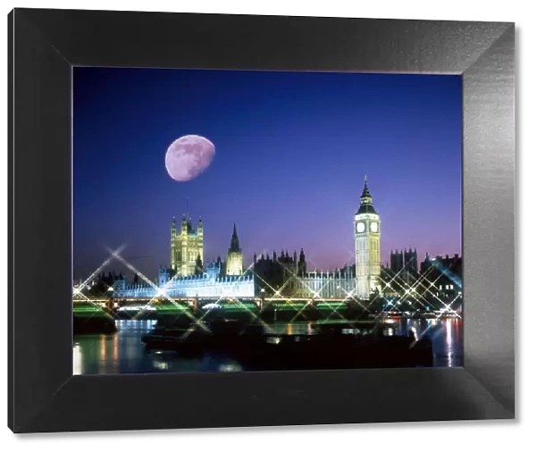 The Houses of Parliament, Westminster at night with Moon