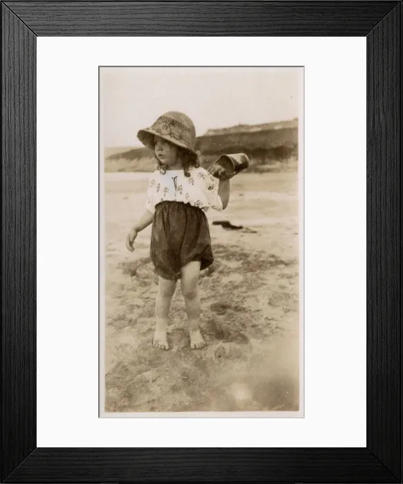 Framed Print : Little girl playing on the beach Framed Print : Little girl playing on the beach