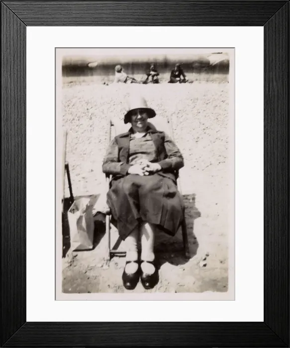 Framed Print : Lady in a deckchair on the beach Framed Print : Lady in a deckchair on the beach