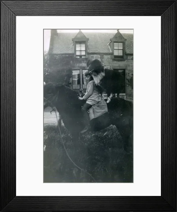 Framed Print : Girl with pet dog on horseback, 1920s Framed Print : Girl with pet dog on horseback, 1920s