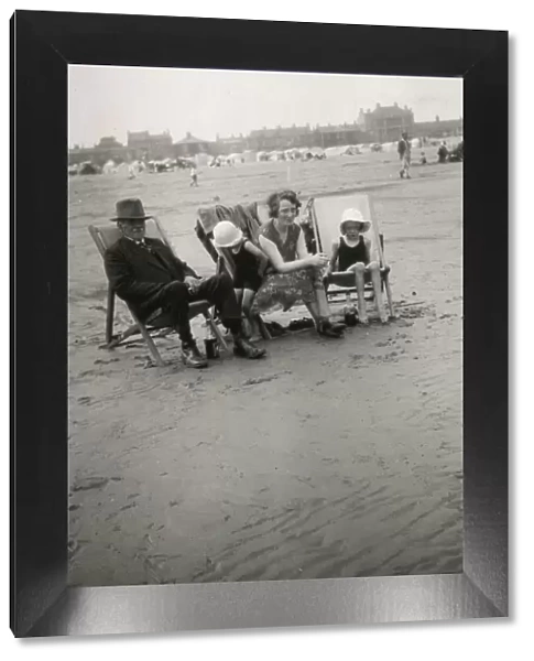 Family group at seaside, 1920s