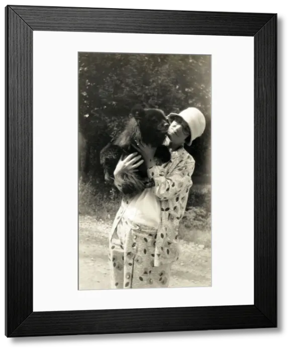 Framed Print : Lady in Toronto, Ontario, Canada posing with a bear cub Framed Print : Lady in Toronto, Ontario, Canada posing with a bear cub