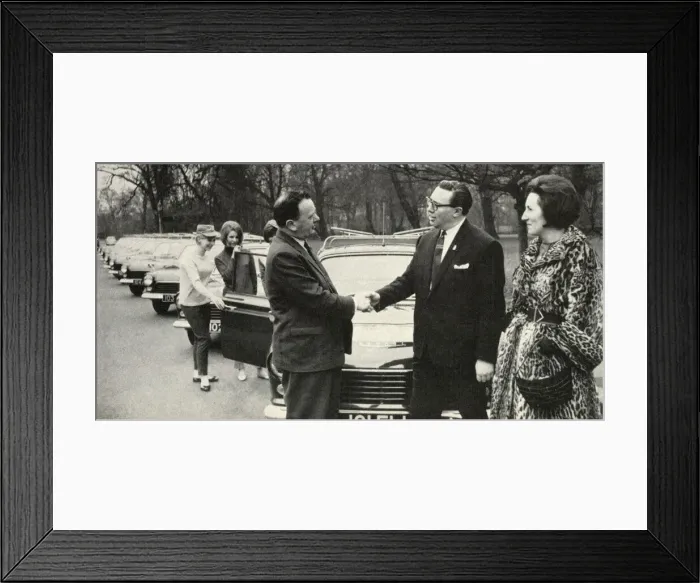 Framed Print : Managing Director of Welbeck Minicabs accepts new fleet cars Framed Print : Managing Director of Welbeck Minicabs accepts new fleet cars