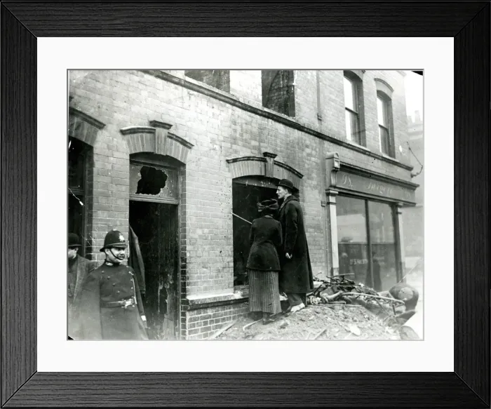 Framed Print : People looking at bullet holes after Sidney Street Siege Framed Print : People looking at bullet holes after Sidney Street Siege
