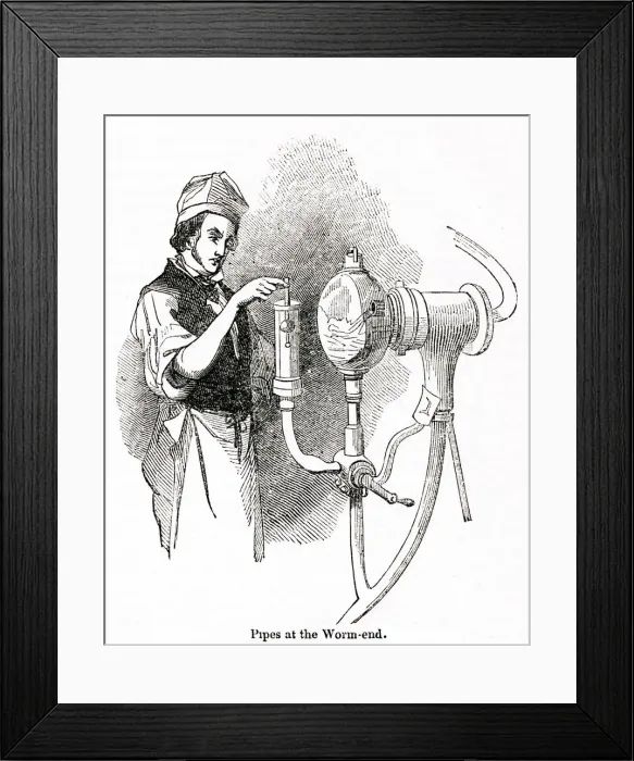 Framed Print : Man checking pipes at a distillery, south-west London Framed Print : Man checking pipes at a distillery, south-west London