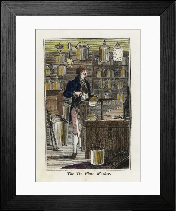 Framed Print : Tin-plate worker in apron beating tin on an Framed Print : Tin-plate worker in apron beating tin on an