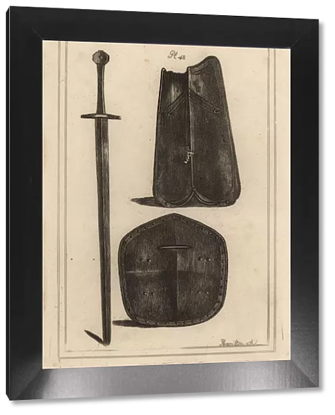 Breastplate, shield and two-handed sword