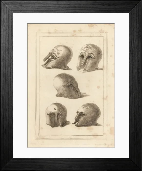 Framed Print : Ancient Greek brass helmet and another similar one Framed Print : Ancient Greek brass helmet and another similar one