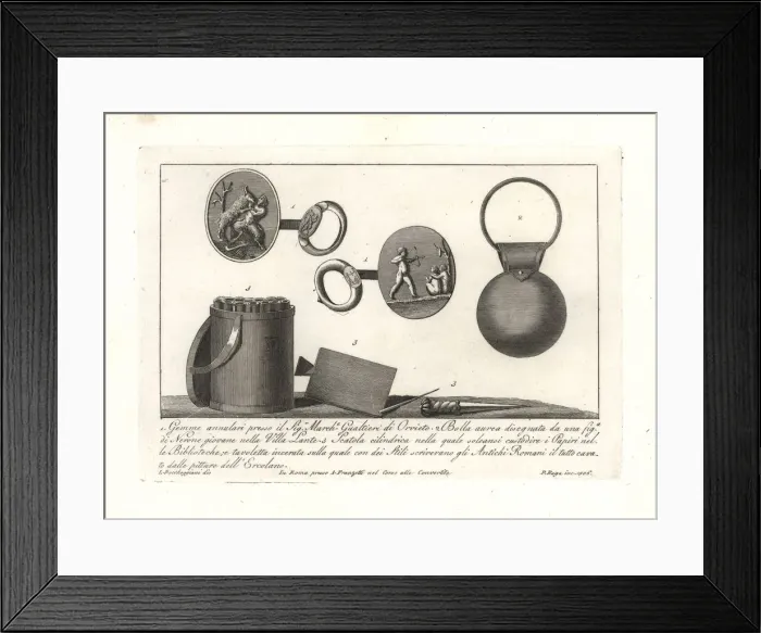 Framed Print : Cameo rings, gold bauble and writing tools Framed Print : Cameo rings, gold bauble and writing tools