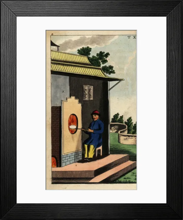 Framed Print : Chinese potter firing a porcelain plate in Framed Print : Chinese potter firing a porcelain plate in