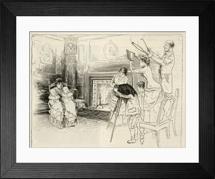 Framed Print : Distracting twin babies sitting for a family photograph Framed Print : Distracting twin babies sitting for a family photograph
