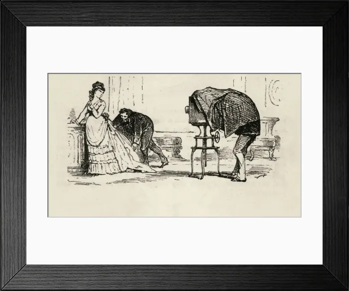 Framed Print : Careful preparations in a photographic studio Framed Print : Careful preparations in a photographic studio