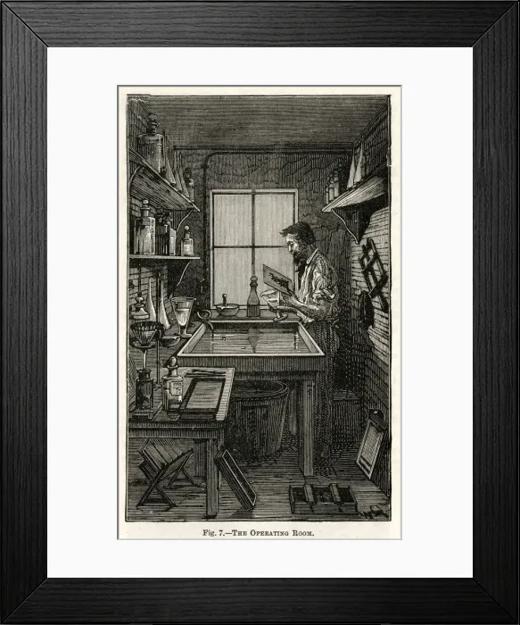Framed Print : Processing photographs Framed Print : Processing photographs