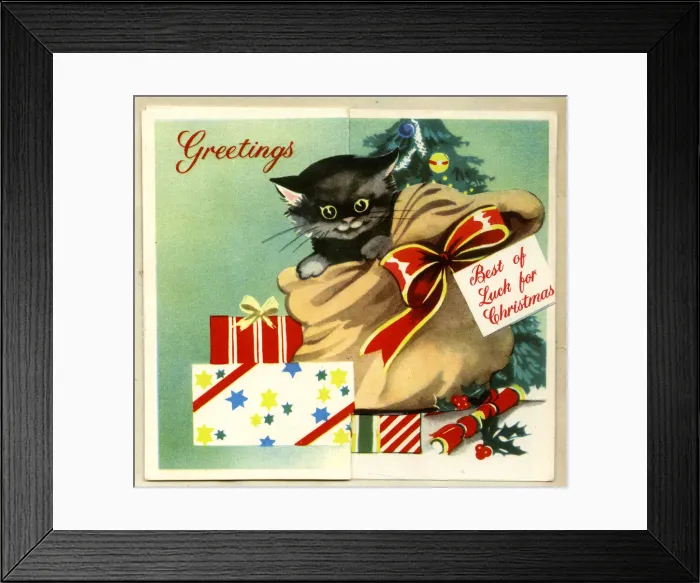 Framed Print : Christmas card, Black kitten in a sack Framed Print : Christmas card, Black kitten in a sack
