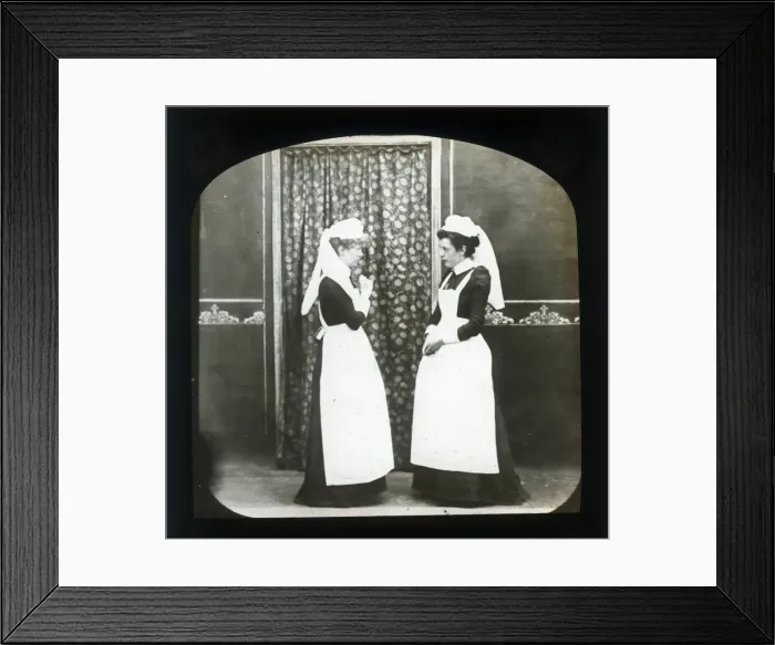 Framed Print : Two female domestic servants in discussion Framed Print : Two female domestic servants in discussion
