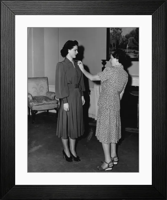 Framed Print : Dolly Tree and Ruth Hussey at a fitting for Flight Command Framed Print : Dolly Tree and Ruth Hussey at a fitting for Flight Command