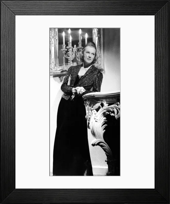 Framed Print : An evening dress for Rita Johnson in Manproof (1938) Framed Print : An evening dress for Rita Johnson in Manproof (1938)