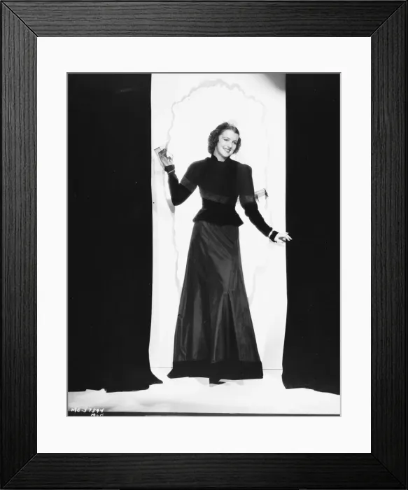Framed Print : Betty Furness in a smart evening ensemble by Dolly Tree