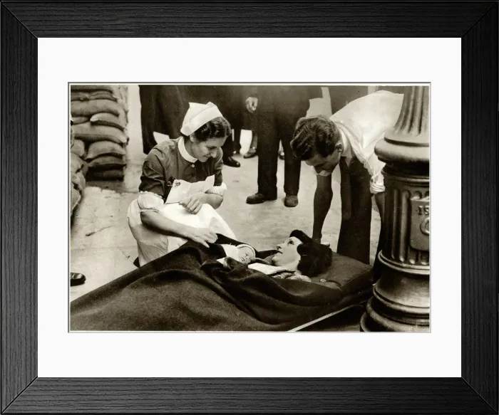 Framed Print : New mother evacuated from hospital 1939 Framed Print : New mother evacuated from hospital 1939