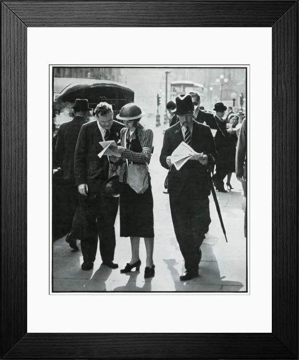 Framed Print : Female and male warden conferring in street, Sept 1939 Framed Print : Female and male warden conferring in street, Sept 1939