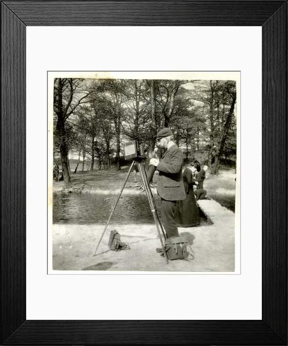 Framed Print : Photographer with camera and tripod Framed Print : Photographer with camera and tripod