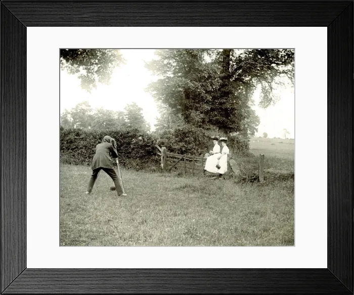Framed Print : Photographing two women on countryside fence Framed Print : Photographing two women on countryside fence
