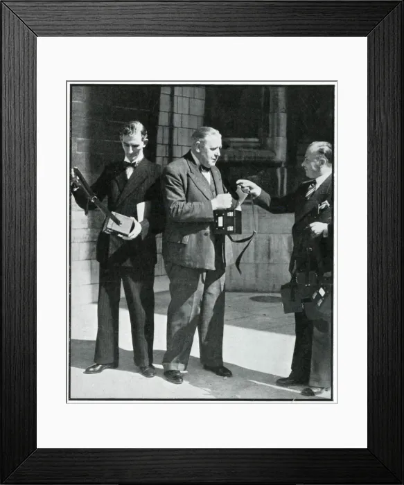 Framed Print : Polish national Mr Hutton offering gas mask cases 1939 Framed Print : Polish national Mr Hutton offering gas mask cases 1939