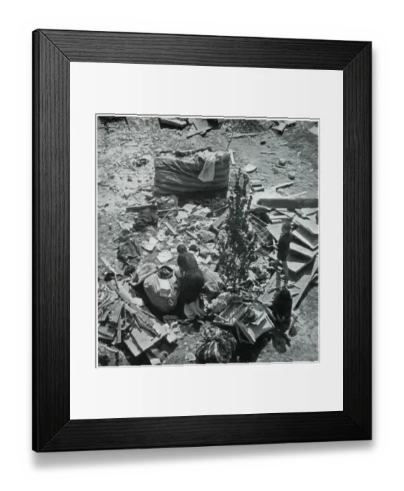 Framed Print : Mother searching for her belongings in debris 1939 Framed Print : Mother searching for her belongings in debris 1939