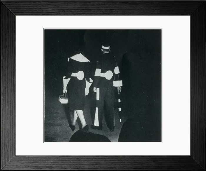 Framed Print : Man and woman in reflective clothing, September 1939 Framed Print : Man and woman in reflective clothing, September 1939