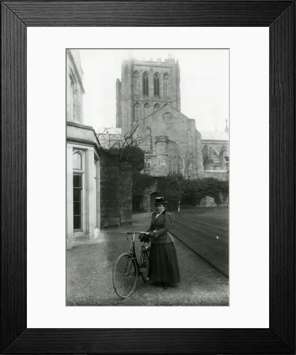 Framed Print : Lady with safety bicycle, Hereford Cathedral Framed Print : Lady with safety bicycle, Hereford Cathedral
