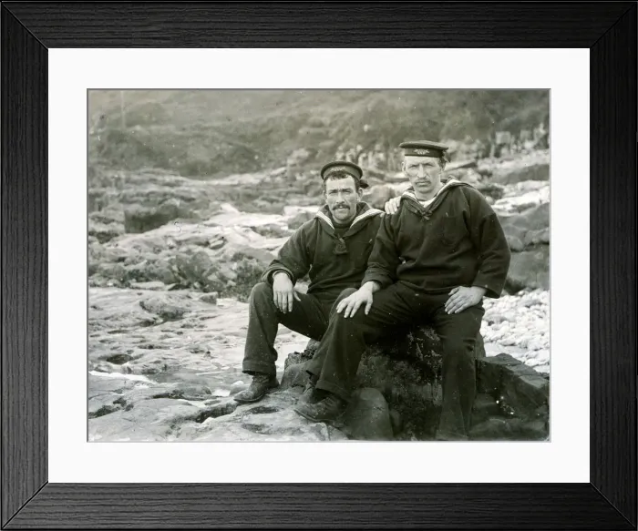 Framed Print : Two sailors sitting on coastal rocks Framed Print : Two sailors sitting on coastal rocks