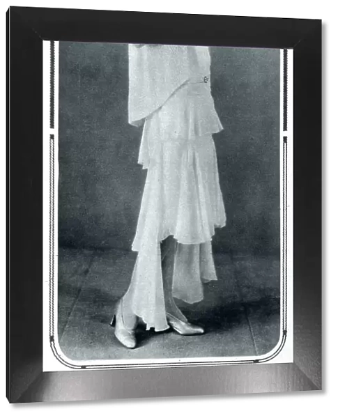 Mme. Lucien Lelong wearing a Lelong design
