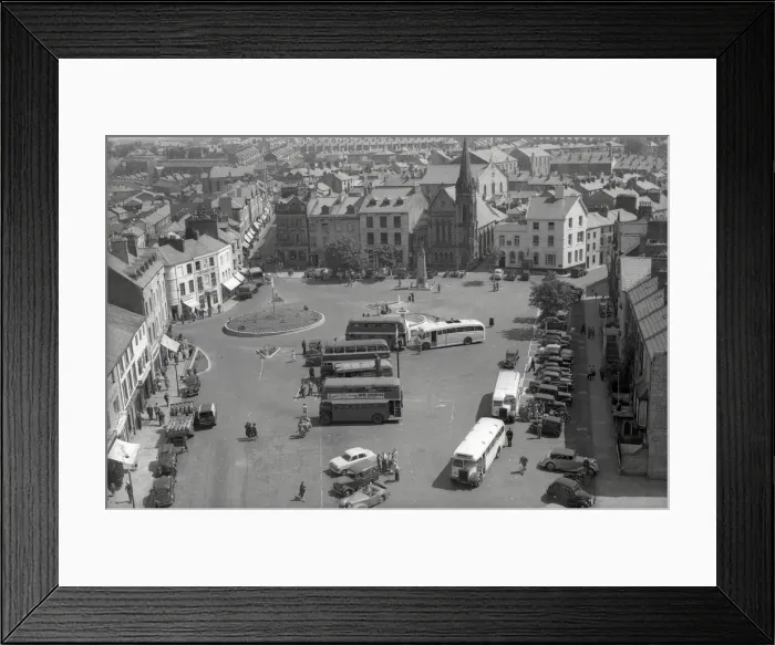 Framed Print : Looking down on Castle Square from Caernarvon Castle Tower Framed Print : Looking down on Castle Square from Caernarvon Castle Tower