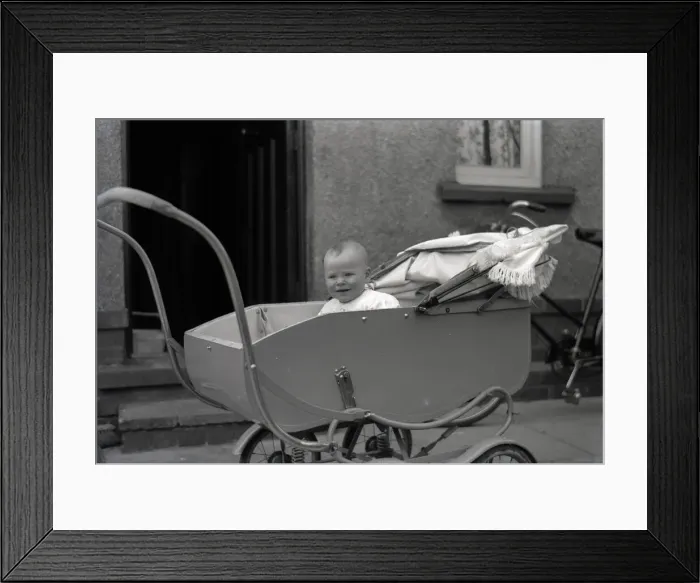 Framed Print : A young baby in a fine perambulator Framed Print : A young baby in a fine perambulator