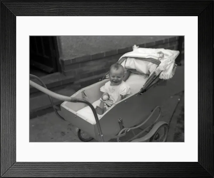 Framed Print : A young baby in a fine pram Framed Print : A young baby in a fine pram