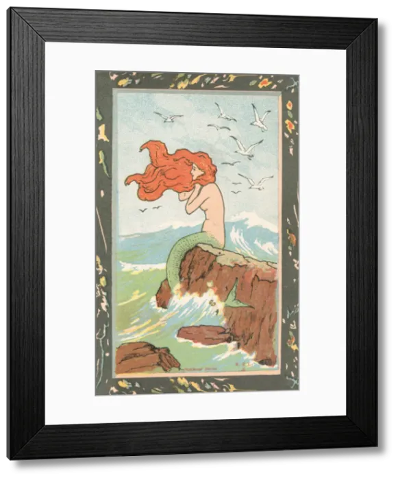 Framed Print : Mermaid seated on a rock. Art nouveau style. Date: 1903 Framed Print : Mermaid seated on a rock. Art nouveau style. Date: 1903