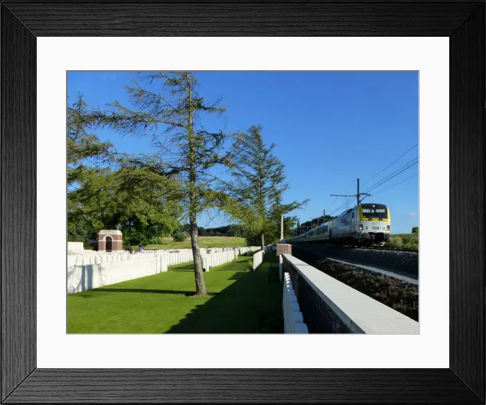 Framed Print : Ypres train passing Larch Wood CWGC Cemetery Framed Print : Ypres train passing Larch Wood CWGC Cemetery