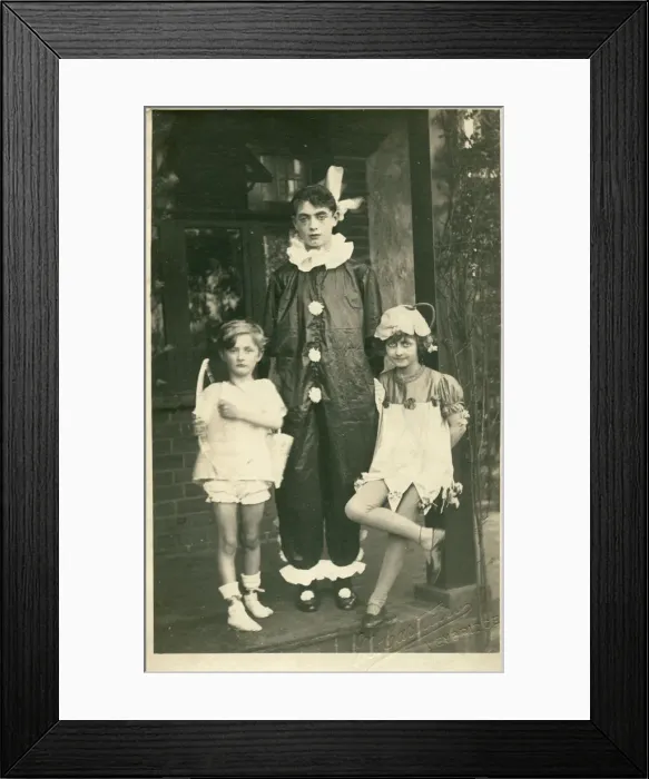 Framed Print : Three children in fancy dress, as cupid, a clown or pierrot Framed Print : Three children in fancy dress, as cupid, a clown or pierrot