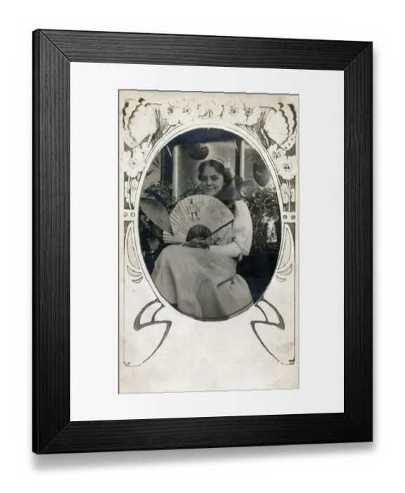 Framed Print : Pretty young girl holding a Stowers promotional fan Framed Print : Pretty young girl holding a Stowers promotional fan