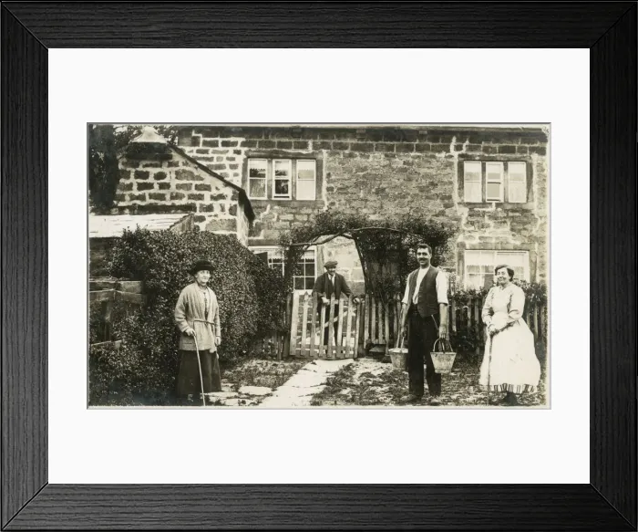 Framed Print : Extended family outside stone county home