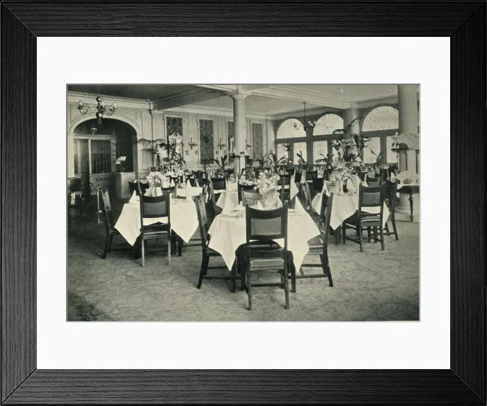 Framed Print : A light and airy restaurant dining-room with starched white tablecloths Framed Print : A light and airy restaurant dining-room with starched white tablecloths