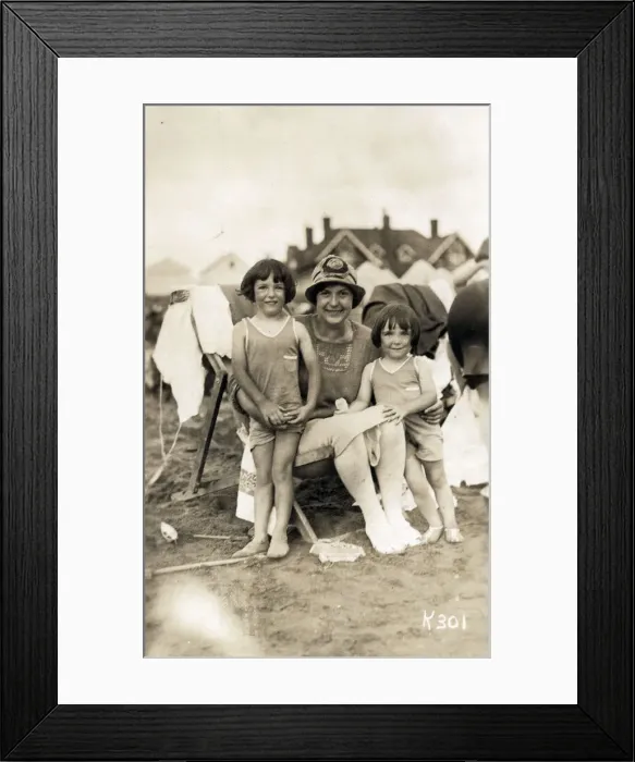 Framed Print : A truly delightful candid seaside photograph of a Mother and her two young daughters on a sandy beach Framed Print : A truly delightful candid seaside photograph of a Mother and her two young daughters on a sandy beach