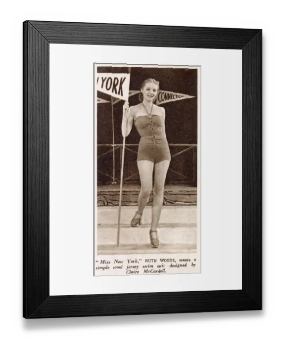 Framed Print : Ruth Woods wears a simple wool jersey swim suit designed by Claire McCardell at a fashion Framed Print : Ruth Woods wears a simple wool jersey swim suit designed by Claire McCardell at a fashion