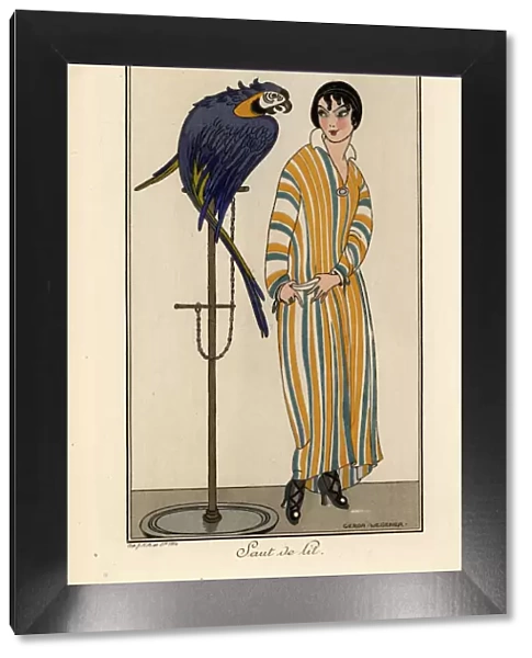 Woman in striped nightgown with pet parrot