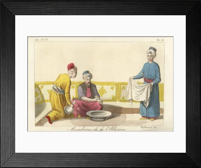 Framed Print : A Muslim man performing his ablutions before prayer