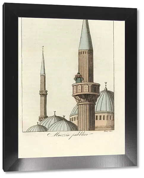 Muezzin in a minaret performing the call to prayer
