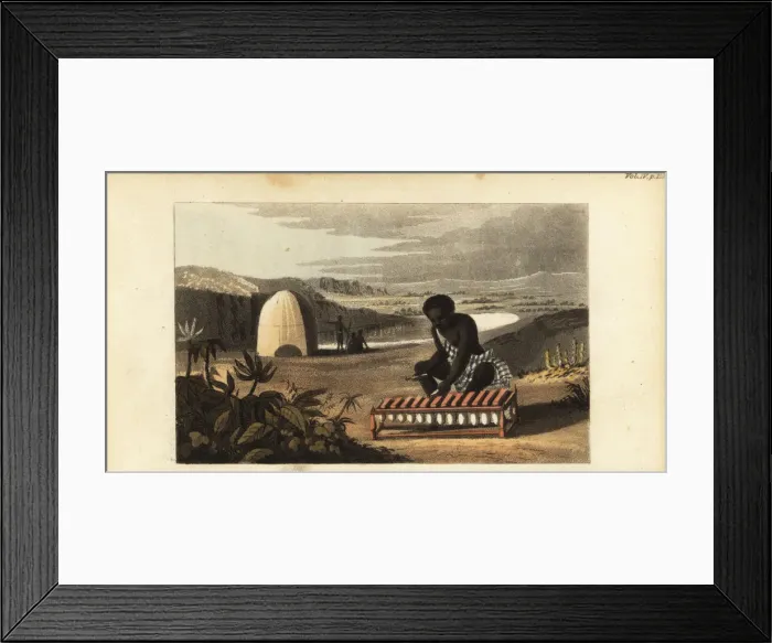 Framed Print : Mandinka man playing a balafon with sticks Framed Print : Mandinka man playing a balafon with sticks